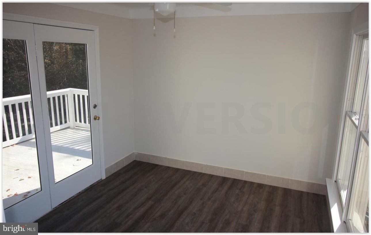 3735 West Ox Road Fairfax, VA 22033 - Photo 13 of 23 Bright and airy space with deck access.