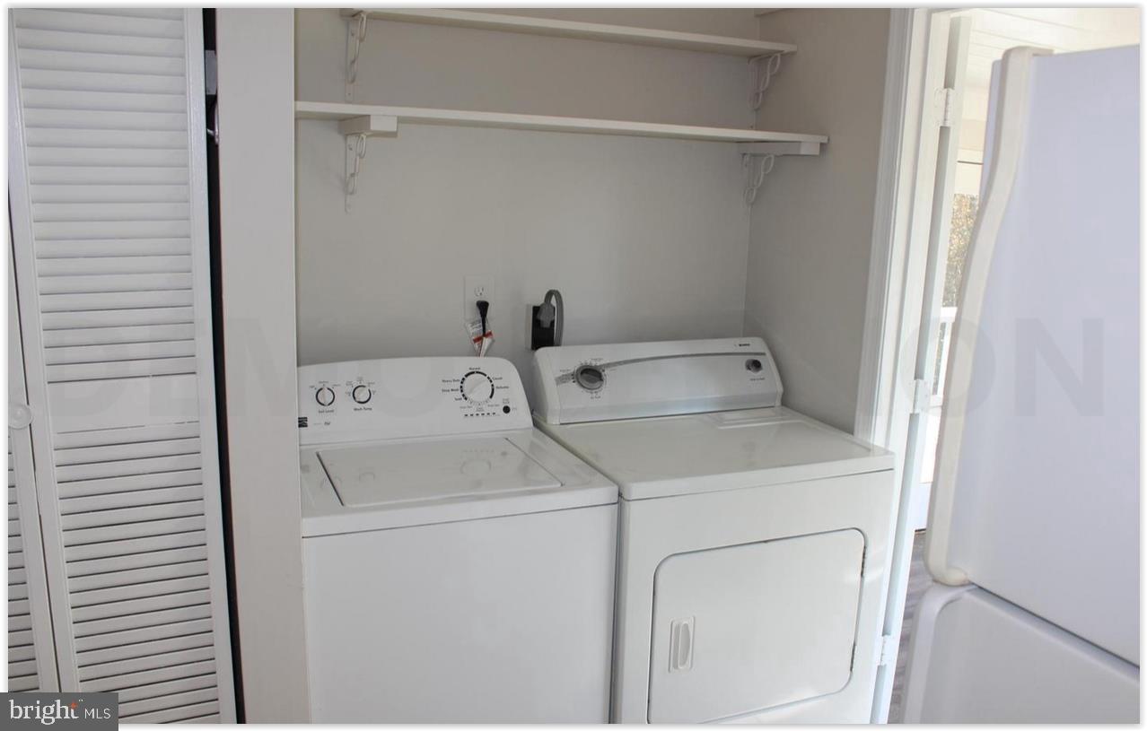 3735 West Ox Road Fairfax, VA 22033 - Photo 10 of 23 Modern laundry space with ample storage.
