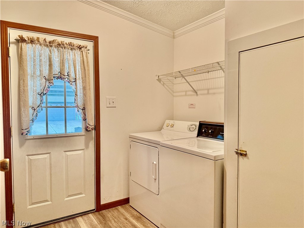 5665 Innkeeper Street Southeast Dennison, OH 44621 - Photo 8 of 13 Laundry room off of kitchen