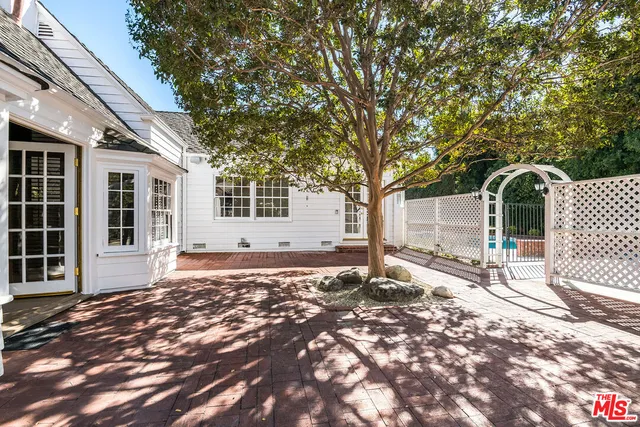 a view of swimming pool with seating space