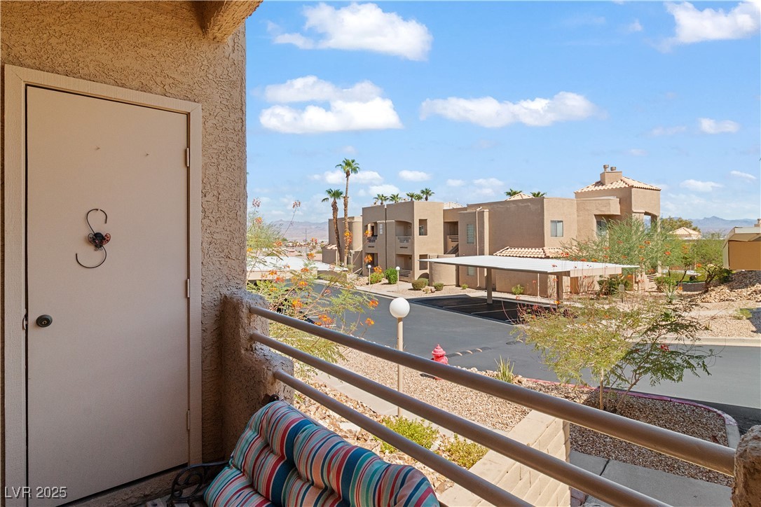 2192 Aspen Mirror Way, Unit 102 Laughlin, NV 89029 - Photo 37 of 58 View of Living room's covered patio / balcony, accessible through the sliding glass door in the Living room
