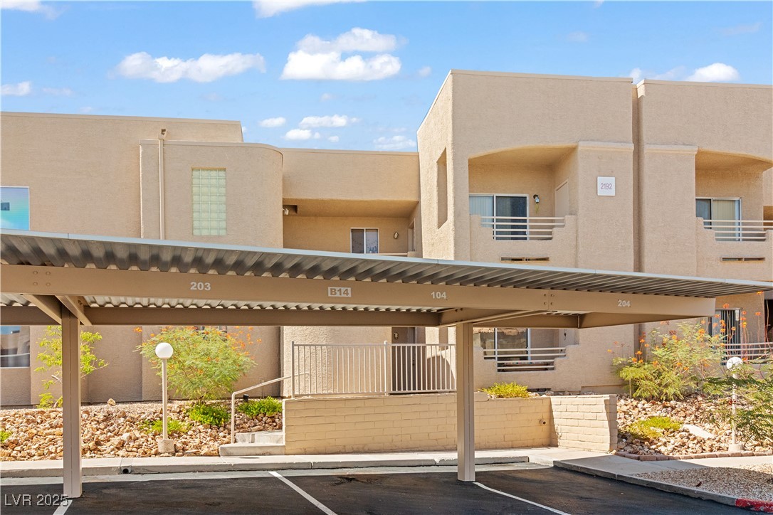 2192 Aspen Mirror Way, Unit 102 Laughlin, NV 89029 - Photo 39 of 58 View of property with covered parking