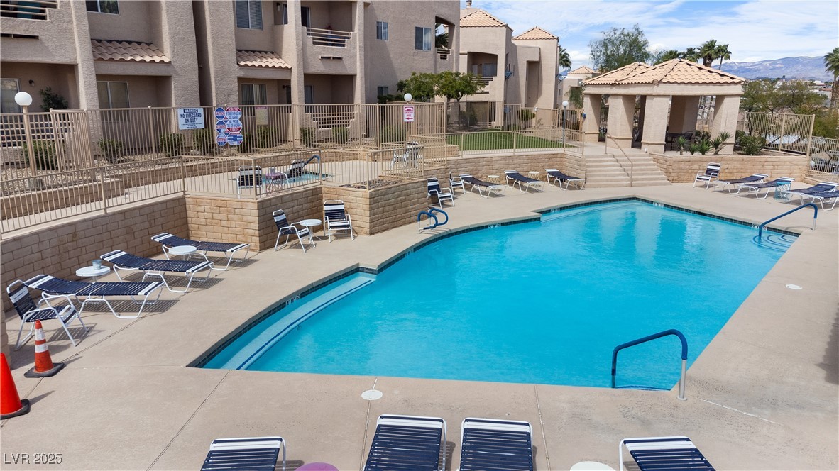 2192 Aspen Mirror Way, Unit 102 Laughlin, NV 89029 - Photo 55 of 58 Community pool featuring a patio area and a gazebo