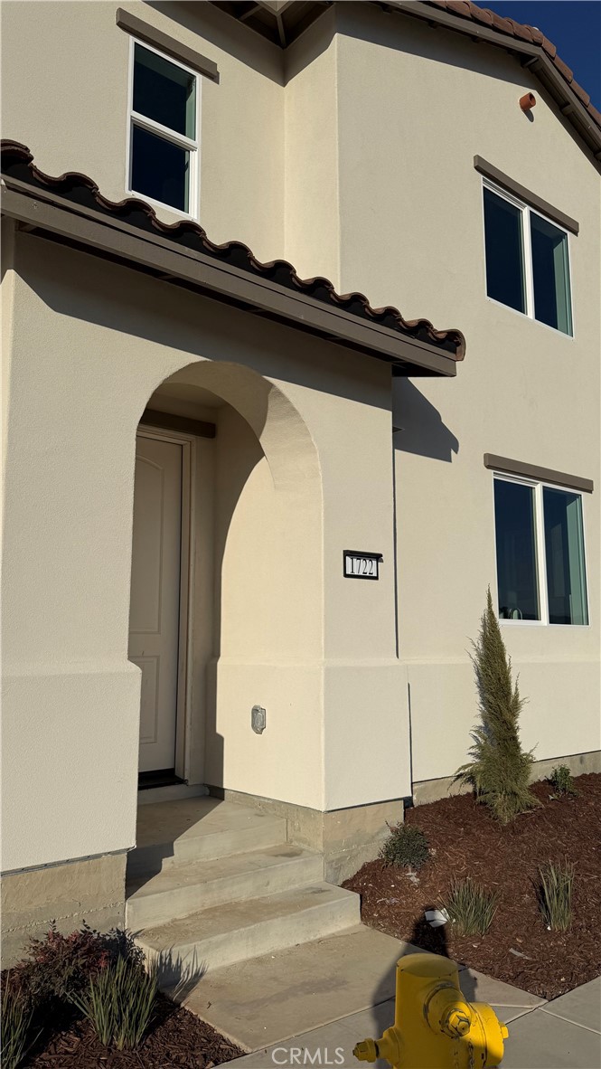 1722 River Vista Way Lompoc, CA 93436 - Photo 2 of 13 a front view of a house with a yard