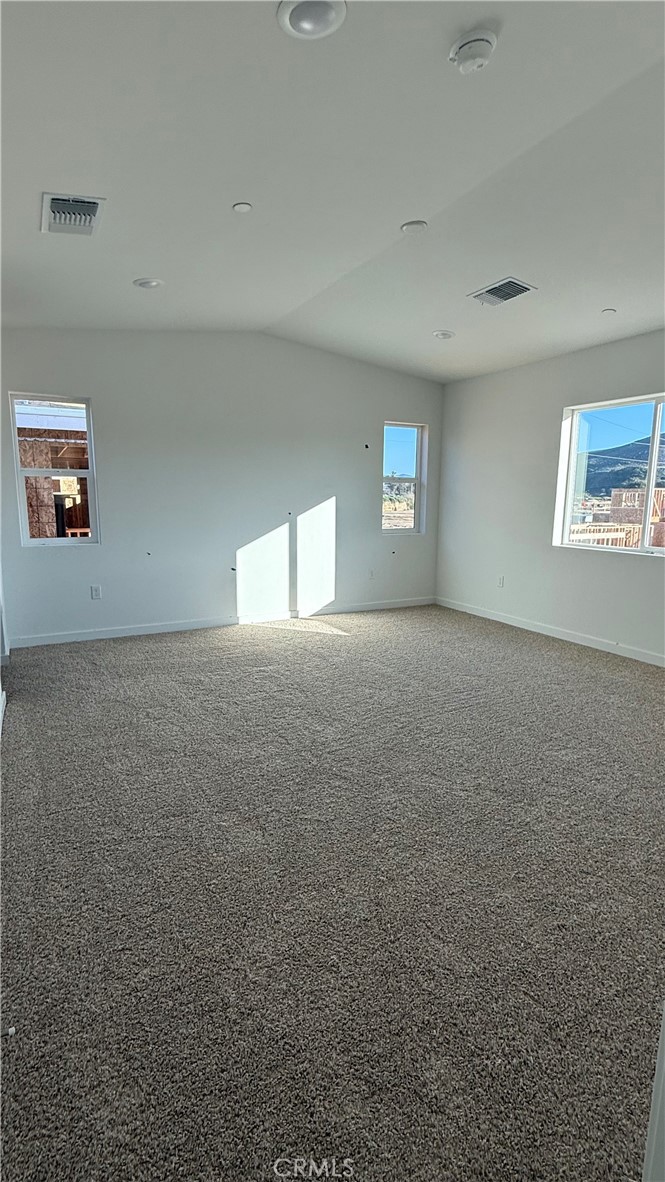 1722 River Vista Way Lompoc, CA 93436 - Photo 7 of 13 a view of an empty room with a window