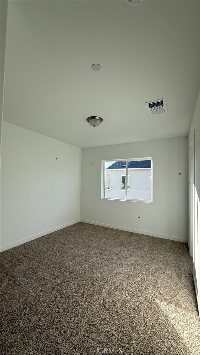 1722 River Vista Way Lompoc, CA 93436 - Photo 10 of 13 an empty room with a window
