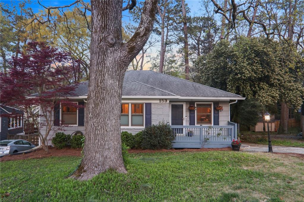 153 Ridley Circle Decatur, GA 30030 - Photo 1 of 1 a front view of a house with a garden