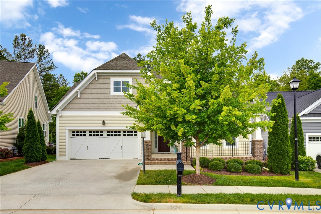 15819 Blooming Road Chesterfield, VA 23832 - Photo 1 of 51 a view of a house with a yard and potted plants
