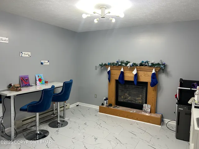 a bedroom with a workspace