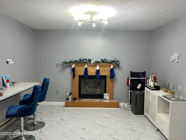 a view of a workspace with furniture