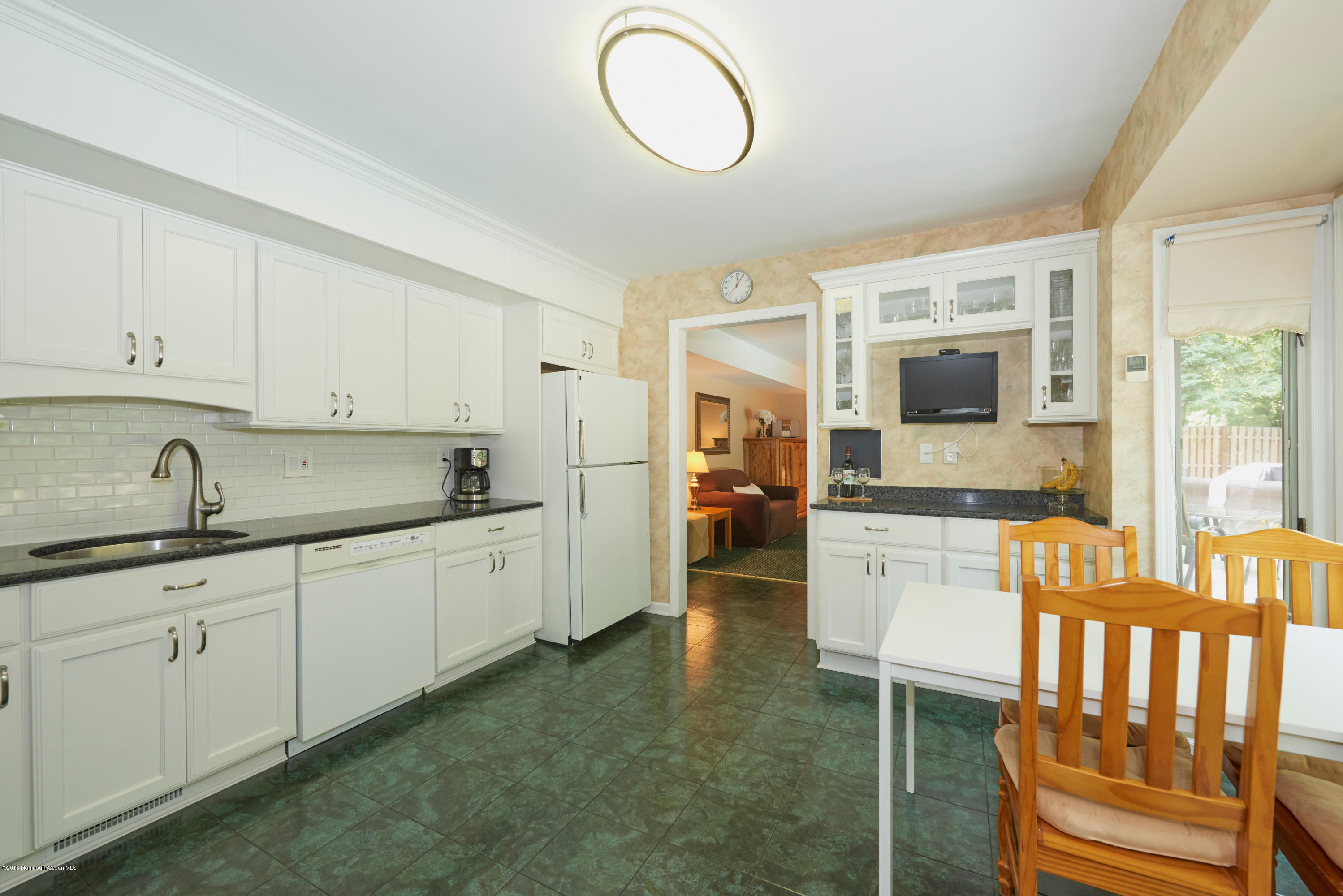 21 Crest Road Middletown, NJ 07748 - Photo 15 of 34 a large kitchen with kitchen island a sink stainless steel appliances and cabinets