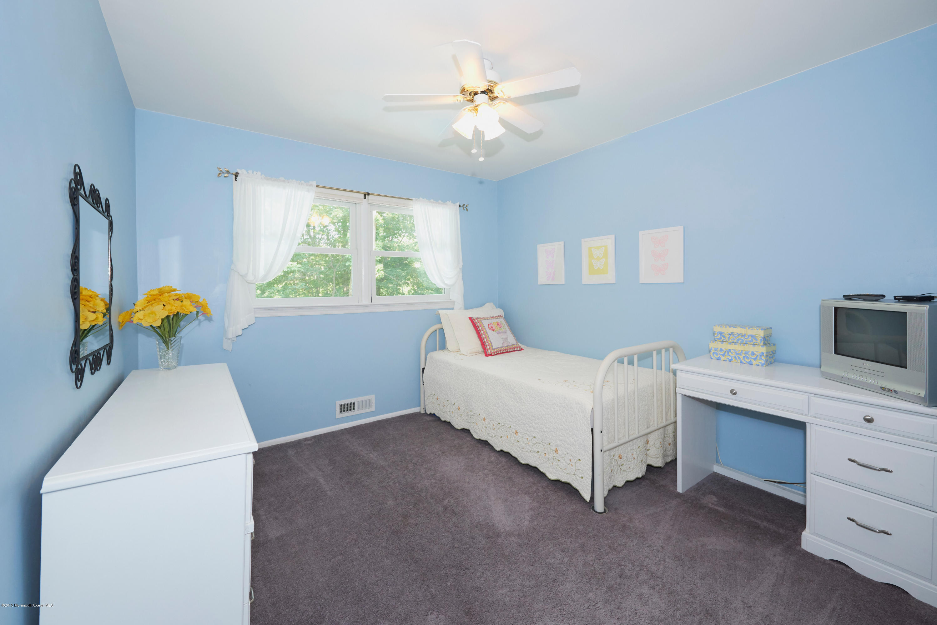 21 Crest Road Middletown, NJ 07748 - Photo 24 of 34 a bed room with a bed and a window