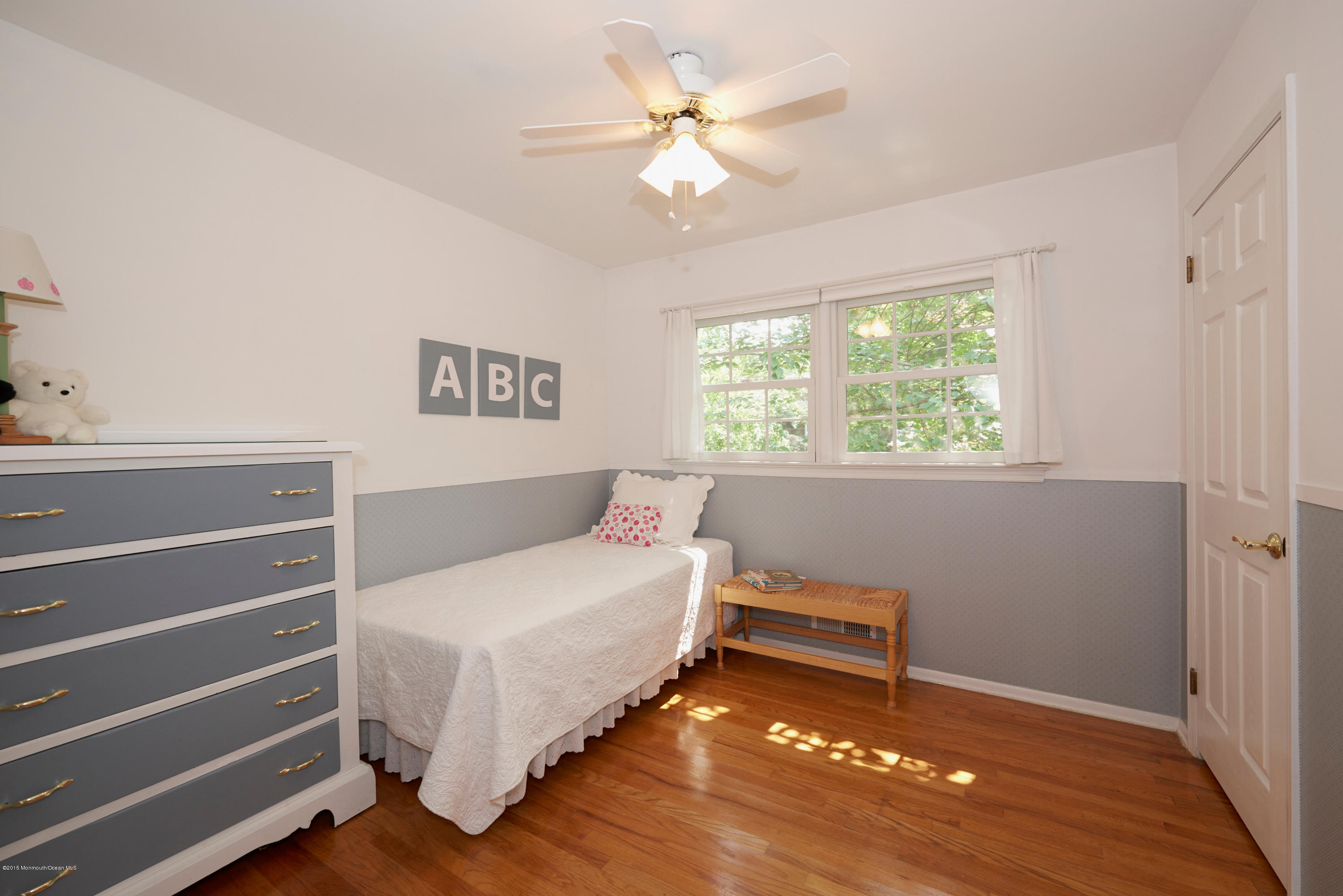 21 Crest Road Middletown, NJ 07748 - Photo 25 of 34 a bedroom with a bed and a window