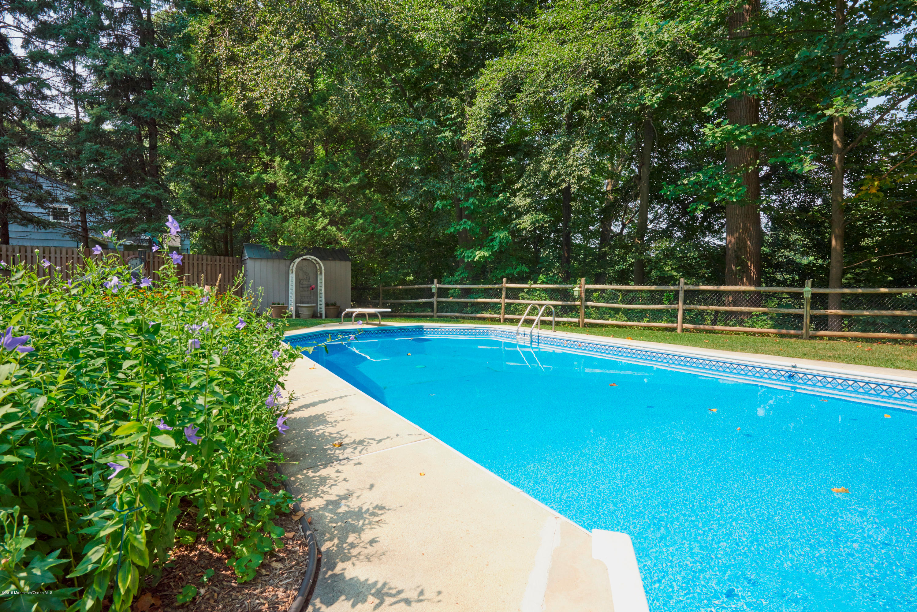 21 Crest Road Middletown, NJ 07748 - Photo 29 of 34 a view of swimming pool with lounge area