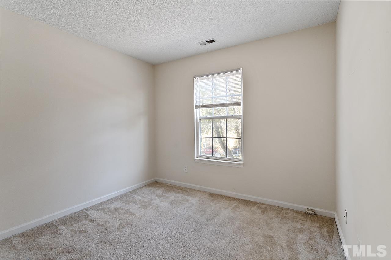 5504 Botany Bay Drive Raleigh, NC 27616 - Photo 22 of 23 an empty room with a window