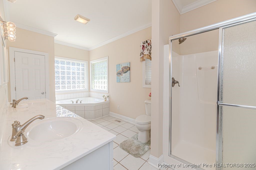 4635 Farrell Road Sanford, NC 27330 - Photo 15 of 30 a bathroom with a sink toilet and shower