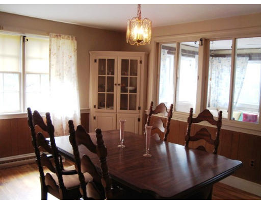 118 Tilden Road Scituate, MA 02066 - Photo 3 of 8 a view of a dining room with furniture window and outside view