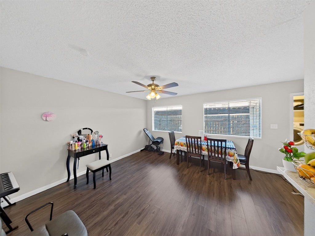 8101 Amelia Road, Unit 404 Houston, TX 77055 - Photo 15 of 39 a living room with furniture and a wooden floor