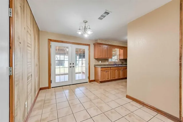 a view of a electric appliances in kitchen and empty room