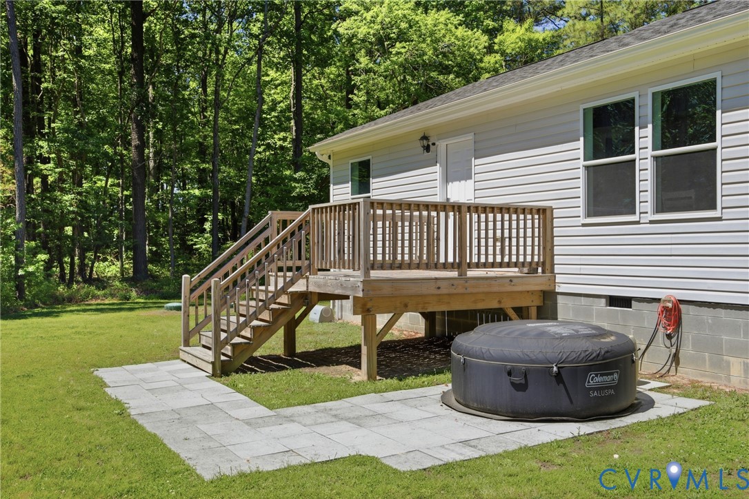 93 Faraway Road Saluda, VA 23149 - Photo 35 of 58 a view of a house with backyard and a sitting area
