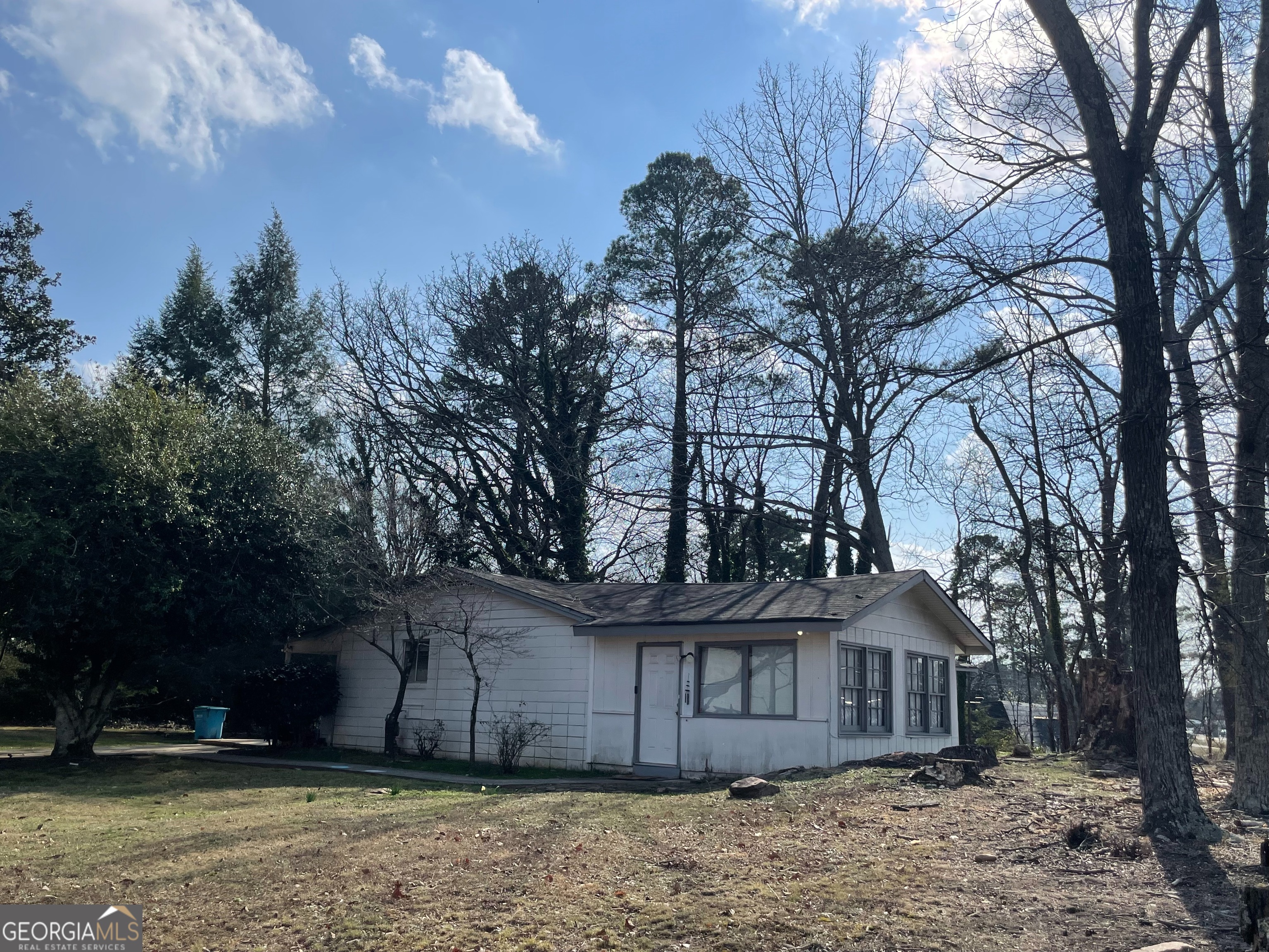 2155 A Rosedale Road Snellville, GA 30078 - Photo 2 of 11 a view of a house with a yard and tree s