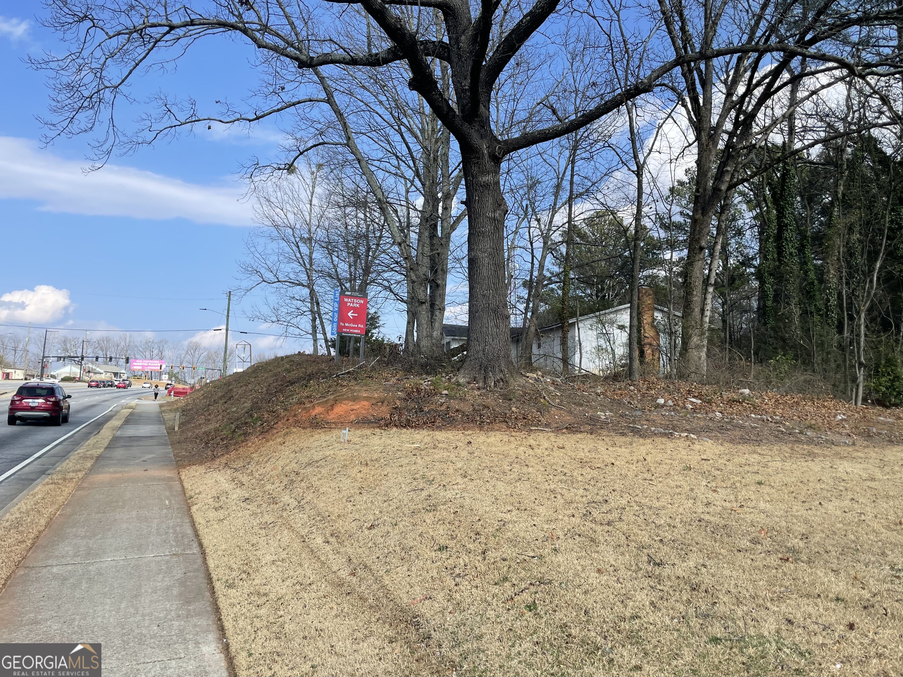 2155 A Rosedale Road Snellville, GA 30078 - Photo 7 of 11 a view of a backyard fountain and a large tree