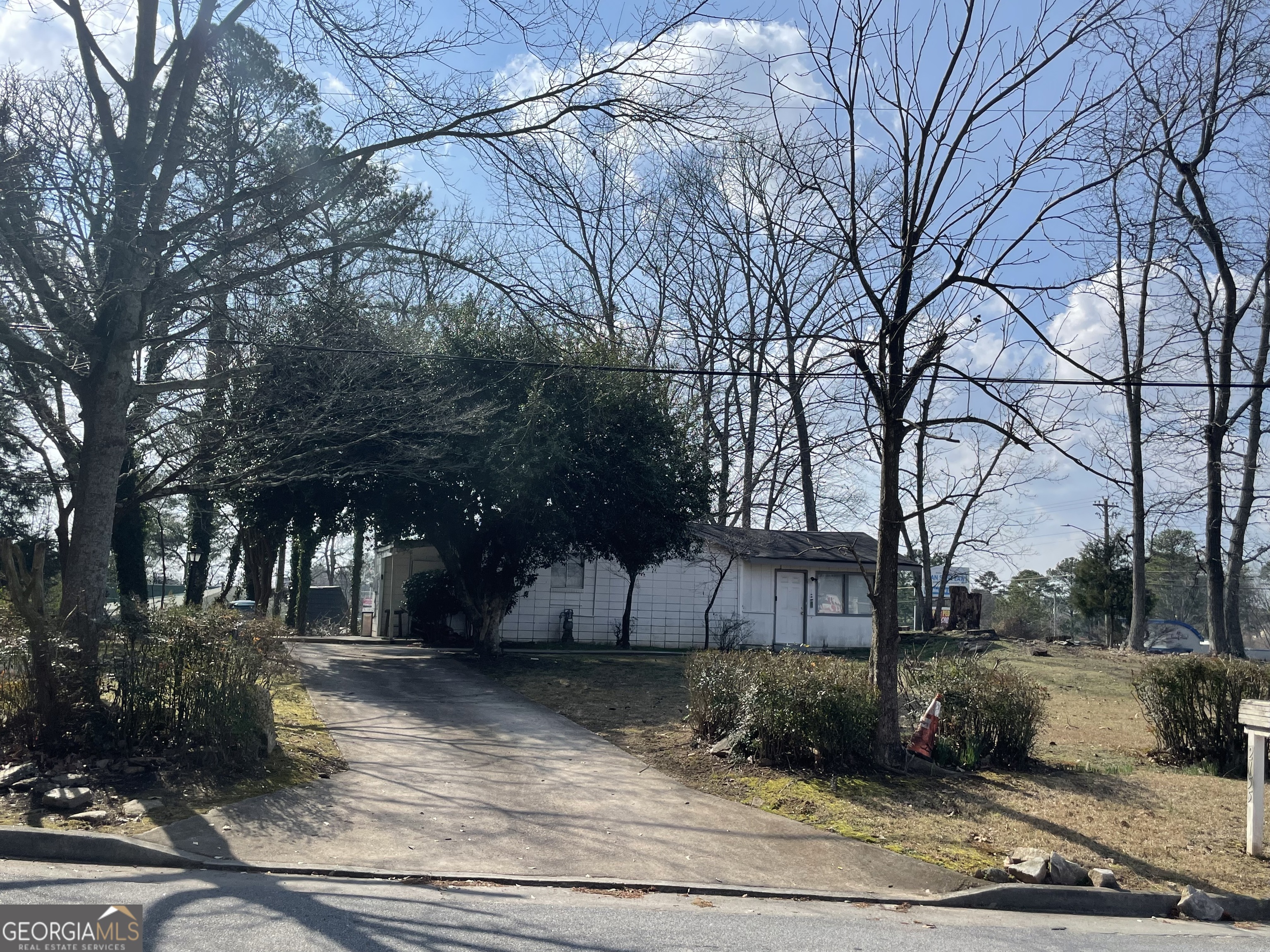 2155 A Rosedale Road Snellville, GA 30078 - Photo 9 of 11 a view of a yard with trees