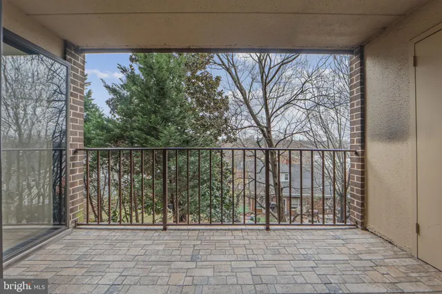 a view of a street from a balcony