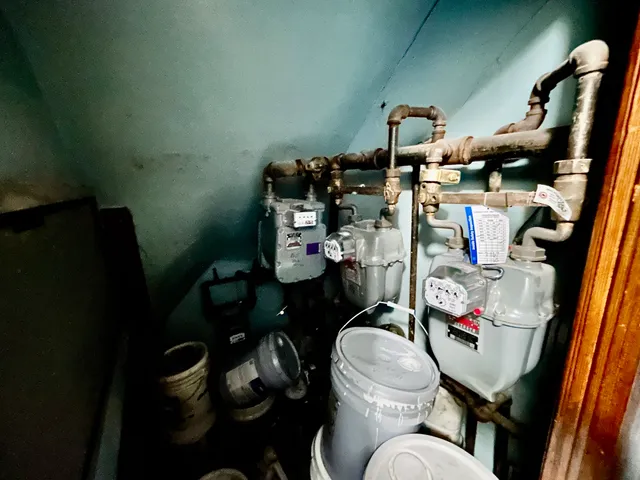 a view of a utility room with windows