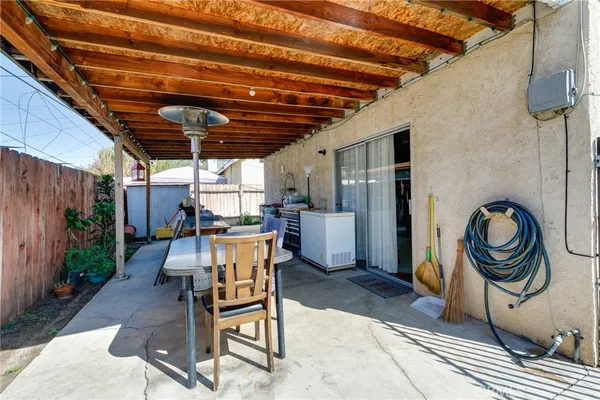 a view of a chairs with a small yard