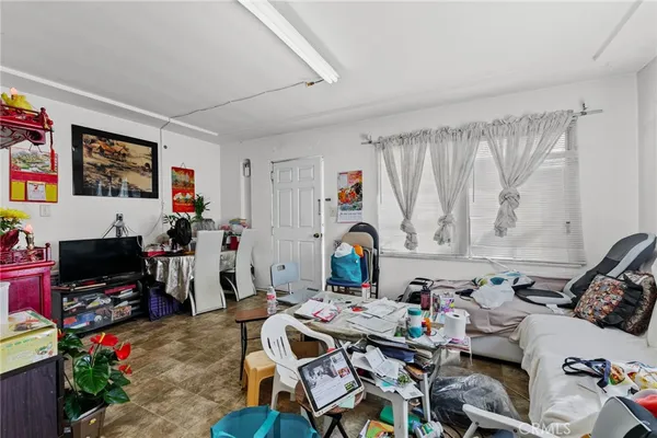 a view of a kitchen with appliances and cabinets