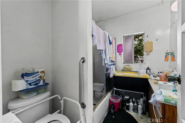 a bed room with a bed and a walk in closet