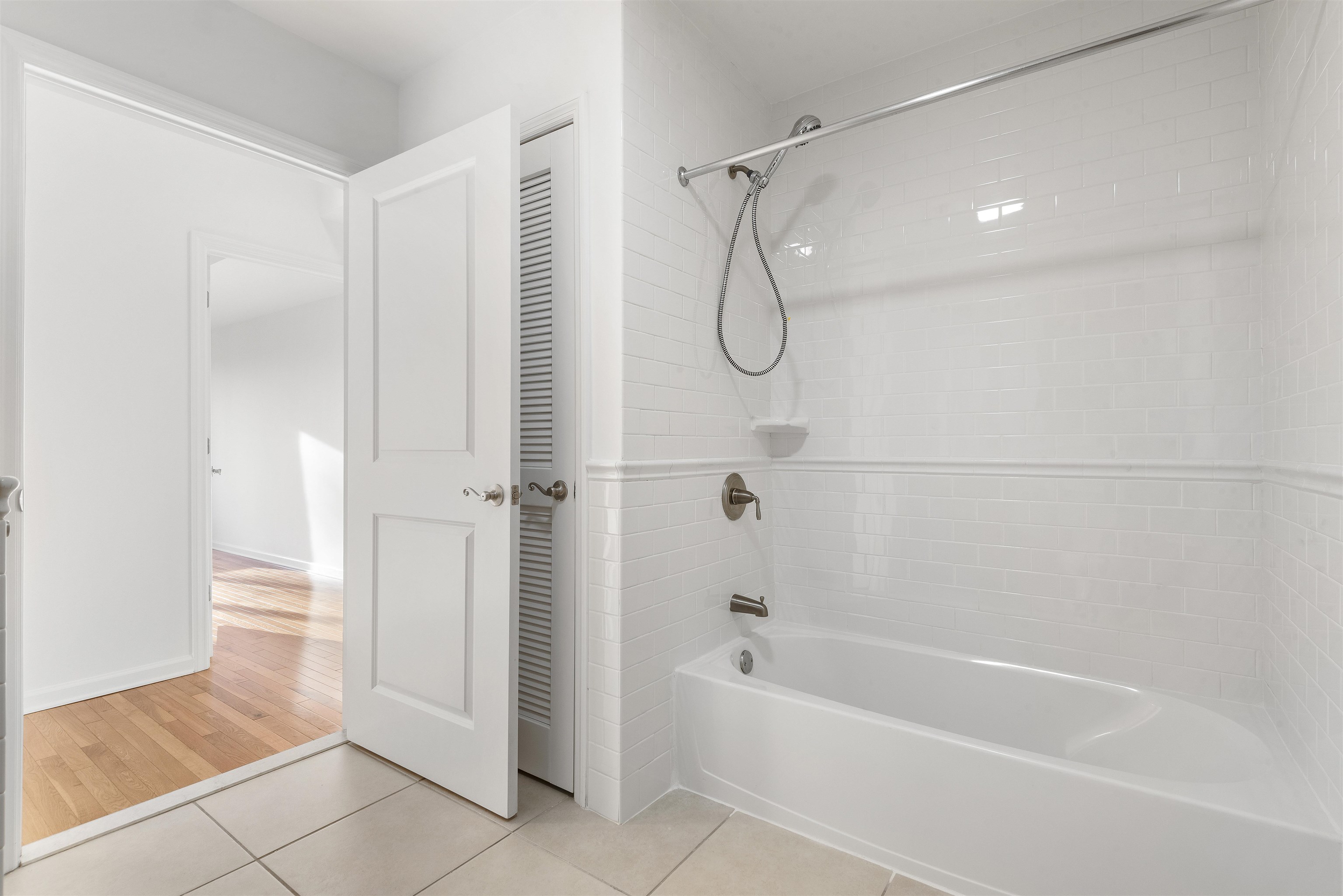 203-207 Hackensack Plank Road, Unit 5B Weehawken, NJ 07086 - Photo 12 of 18 a bathroom with a bathtub and shower