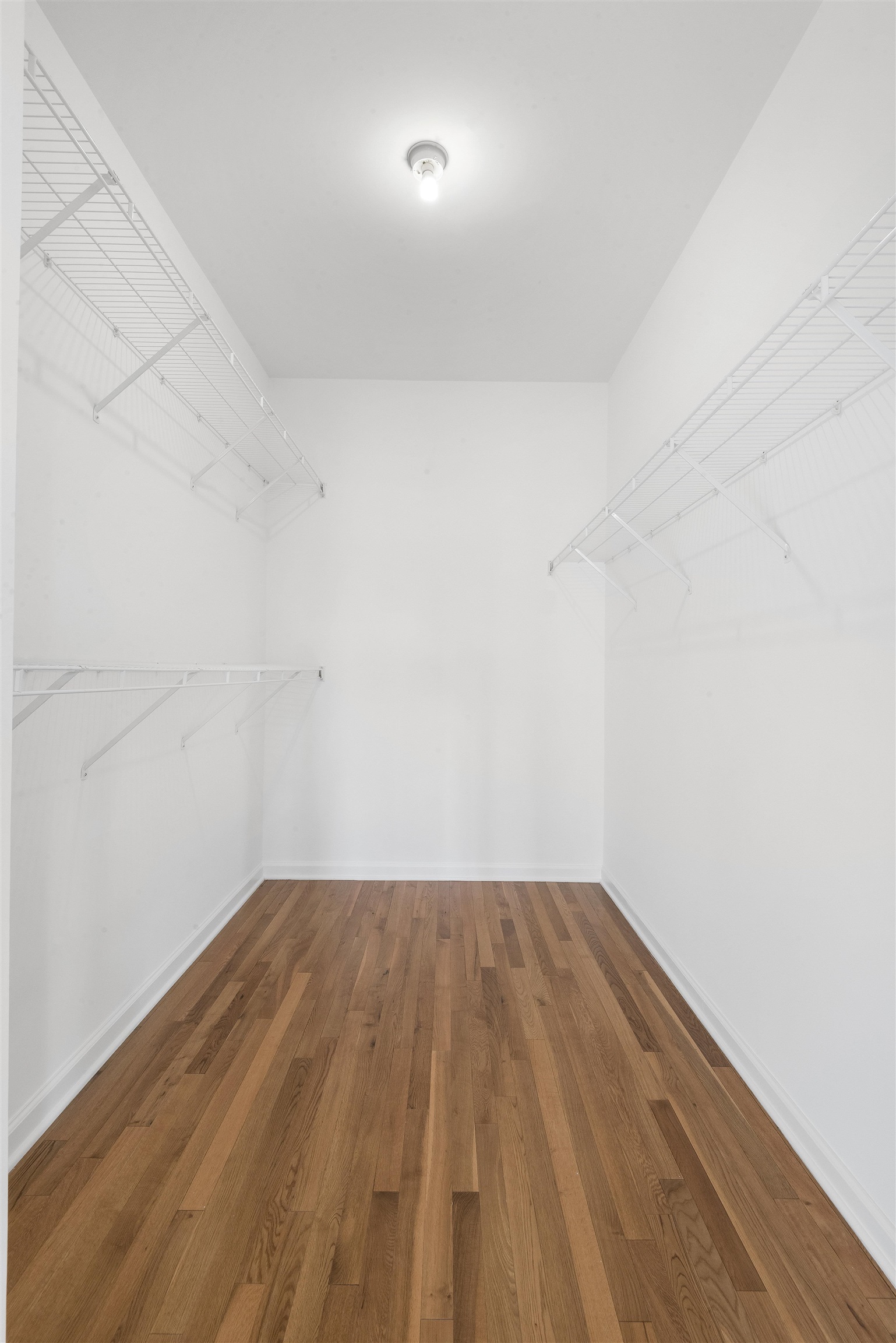 203-207 Hackensack Plank Road, Unit 5B Weehawken, NJ 07086 - Photo 14 of 18 a view of a room with wooden floor