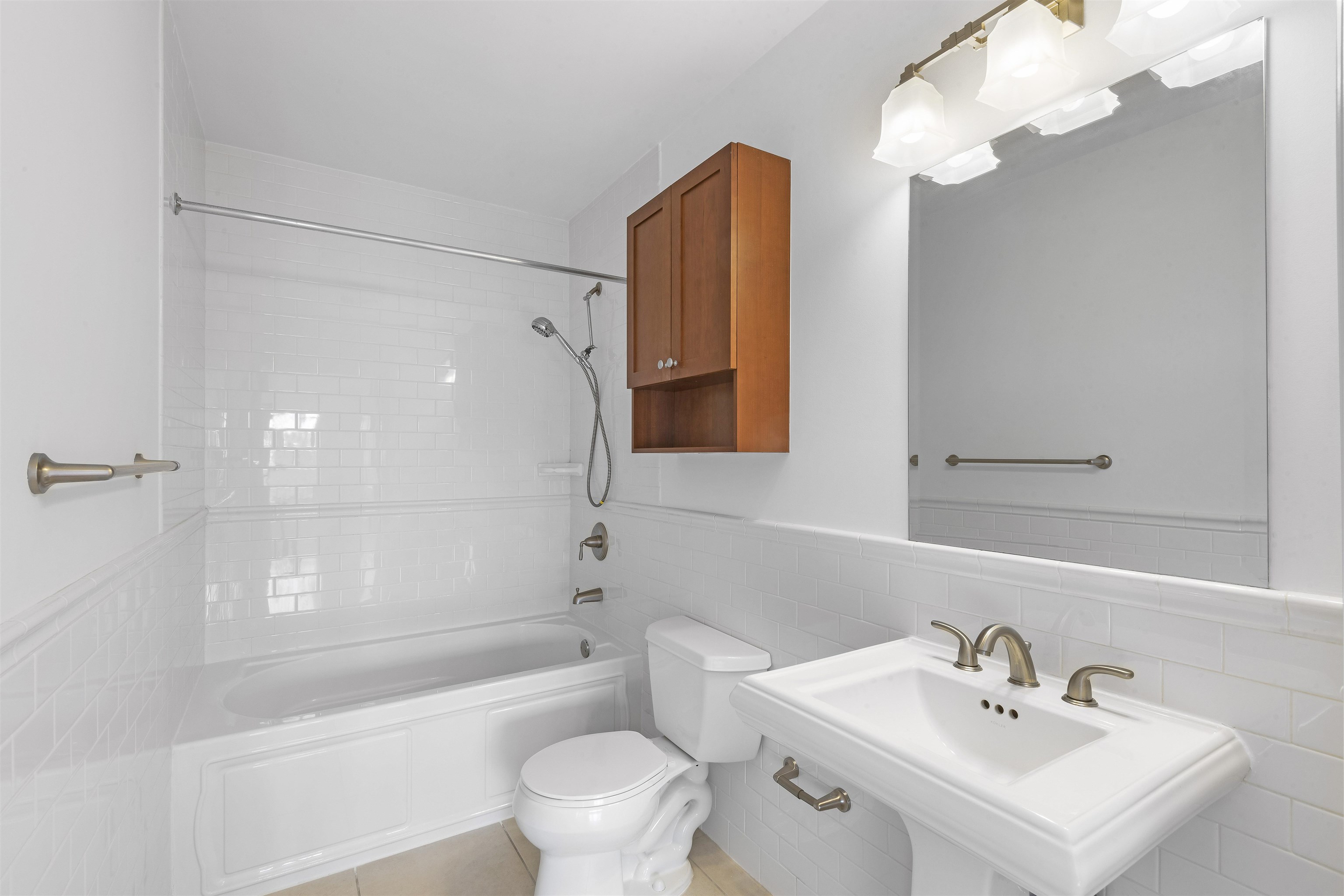 203-207 Hackensack Plank Road, Unit 5B Weehawken, NJ 07086 - Photo 15 of 18 a bathroom with a sink a toilet and a bathtub