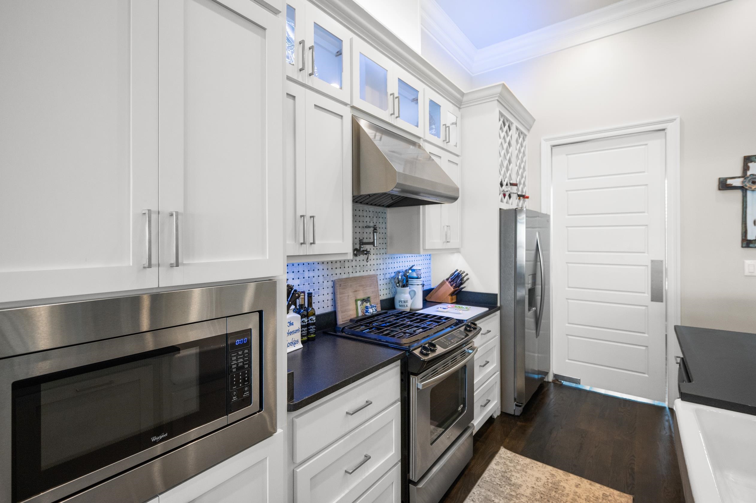 32760 River Road Orange Beach, AL 36561 - Photo 15 of 49 Gas range and custom backsplash