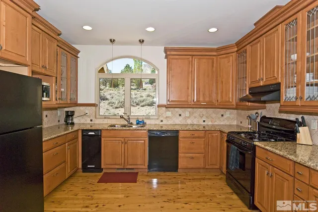 a terrace with outdoor seating and city view