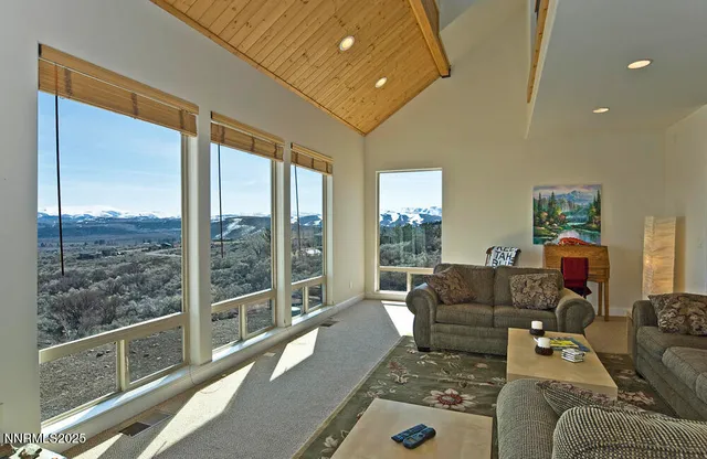 a view of a hallway with windows