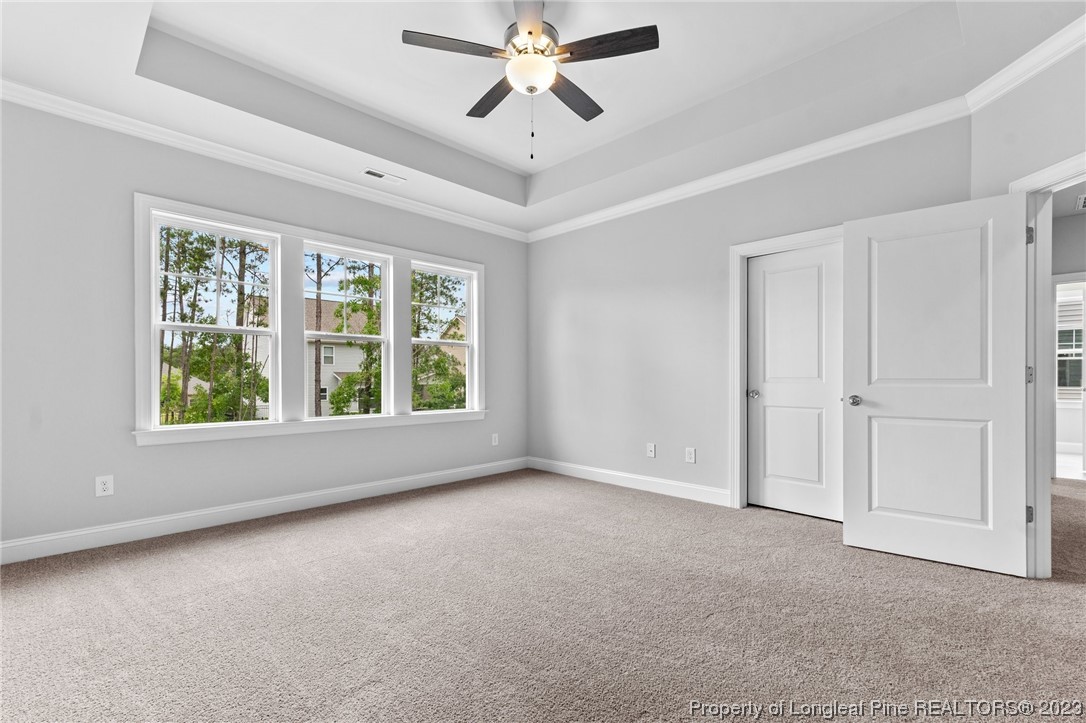 144 Kensington Dr Spring Lake Spring Lake, NC 28390 - Photo 14 of 22 a view of a livingroom with a ceiling fan and window