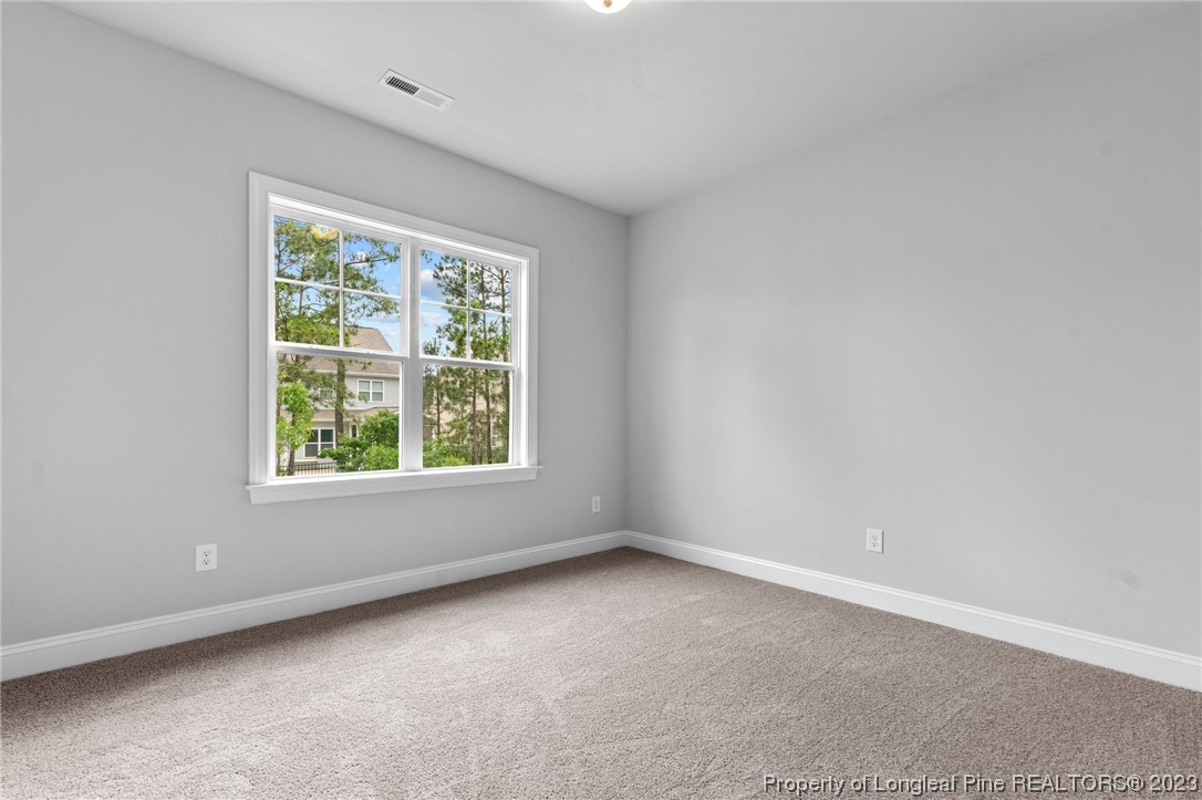 144 Kensington Dr Spring Lake Spring Lake, NC 28390 - Photo 19 of 22 an empty room with a window