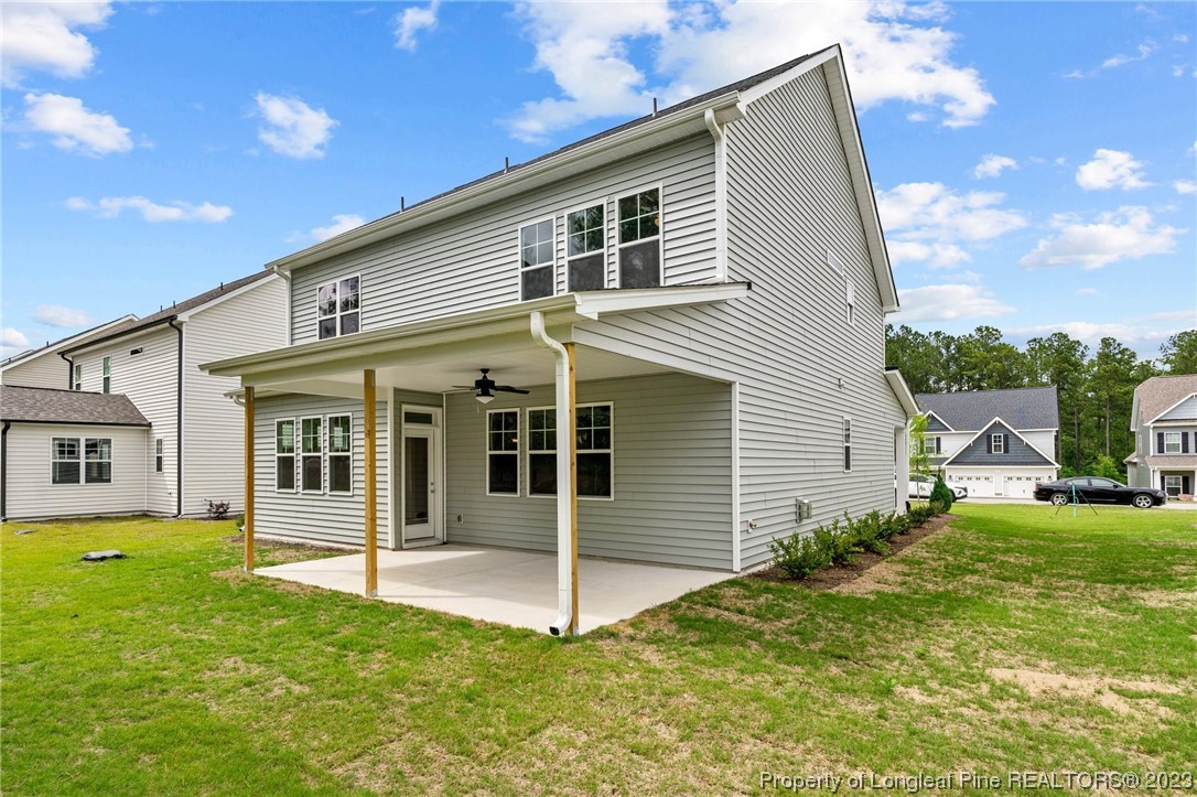 144 Kensington Dr Spring Lake Spring Lake, NC 28390 - Photo 21 of 22 a view of a house with backyard