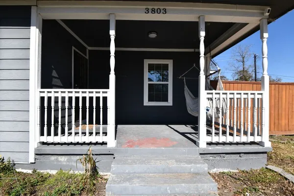 a view of porch with a bench