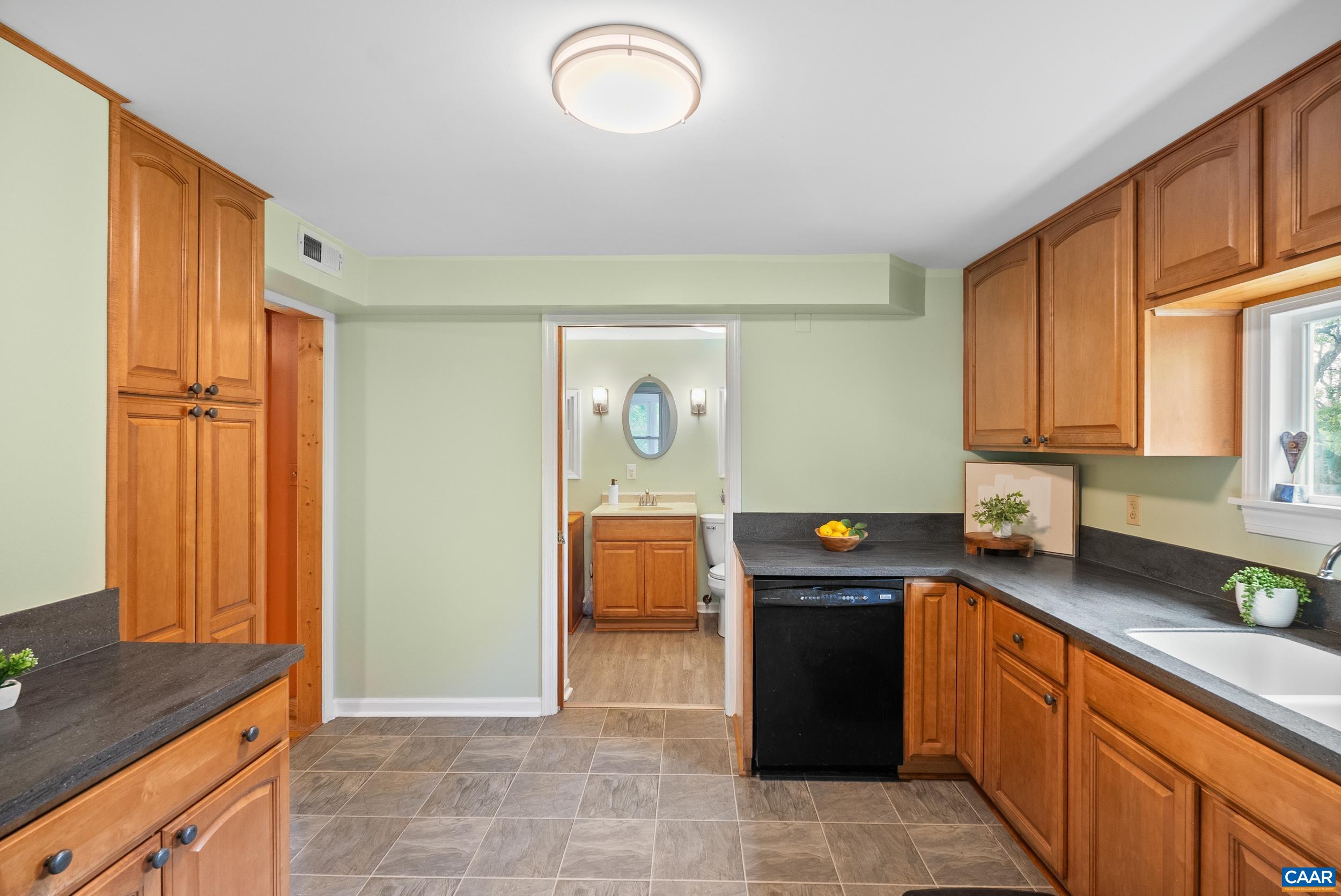 687 Gidsville Road Amherst, VA 24521 - Photo 23 of 70 a kitchen with stainless steel appliances granite countertop a refrigerator and a stove top oven