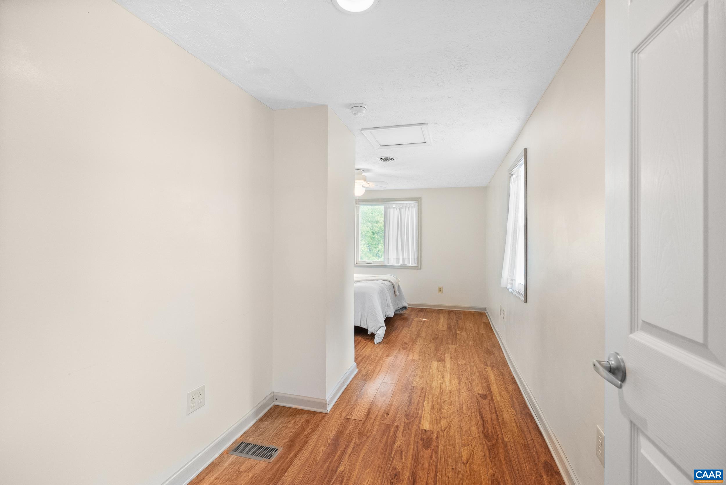 687 Gidsville Road Amherst, VA 24521 - Photo 37 of 70 a view of a room with wooden floor and staircase