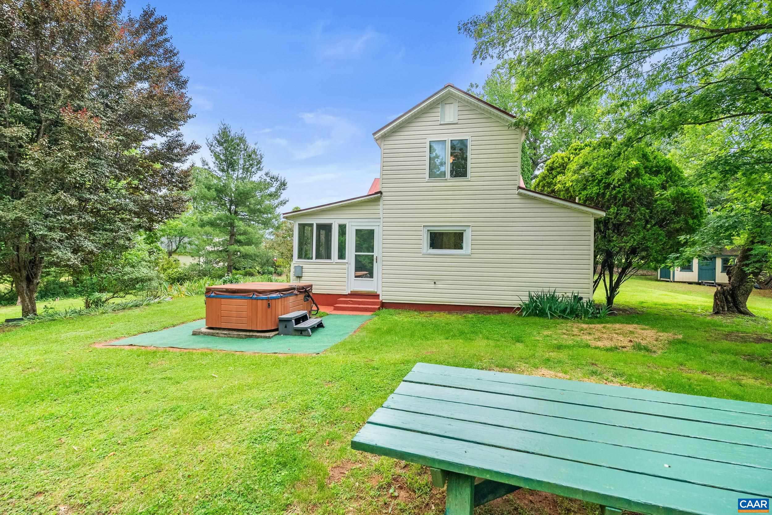 687 Gidsville Road Amherst, VA 24521 - Photo 51 of 70 a front view of a house with garden and trees