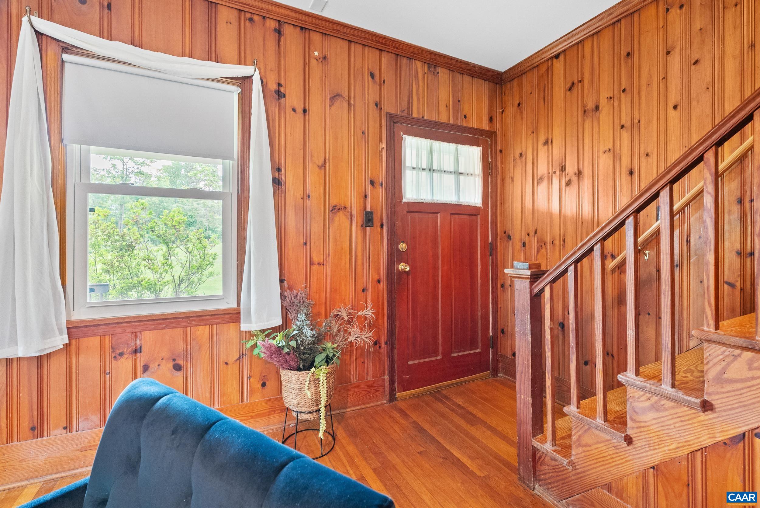 687 Gidsville Road Amherst, VA 24521 - Photo 8 of 70 a view of an entryway with wooden floor and door