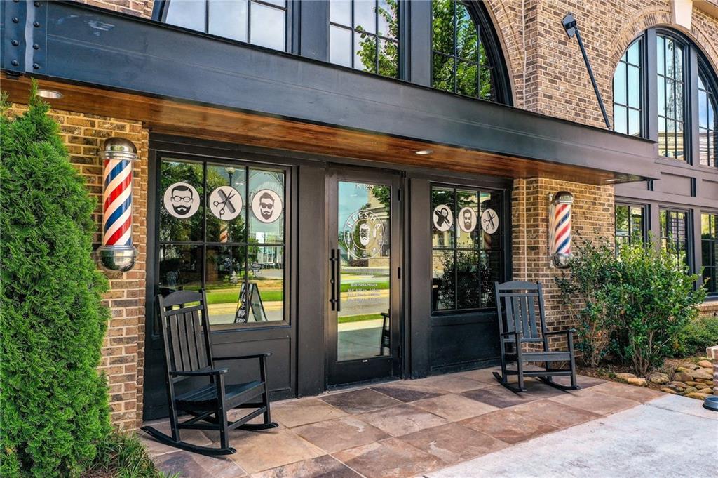 1395 Mid Broadwell Road Alpharetta, GA 30004 - Photo 56 of 67 a front view of a building with sitting area