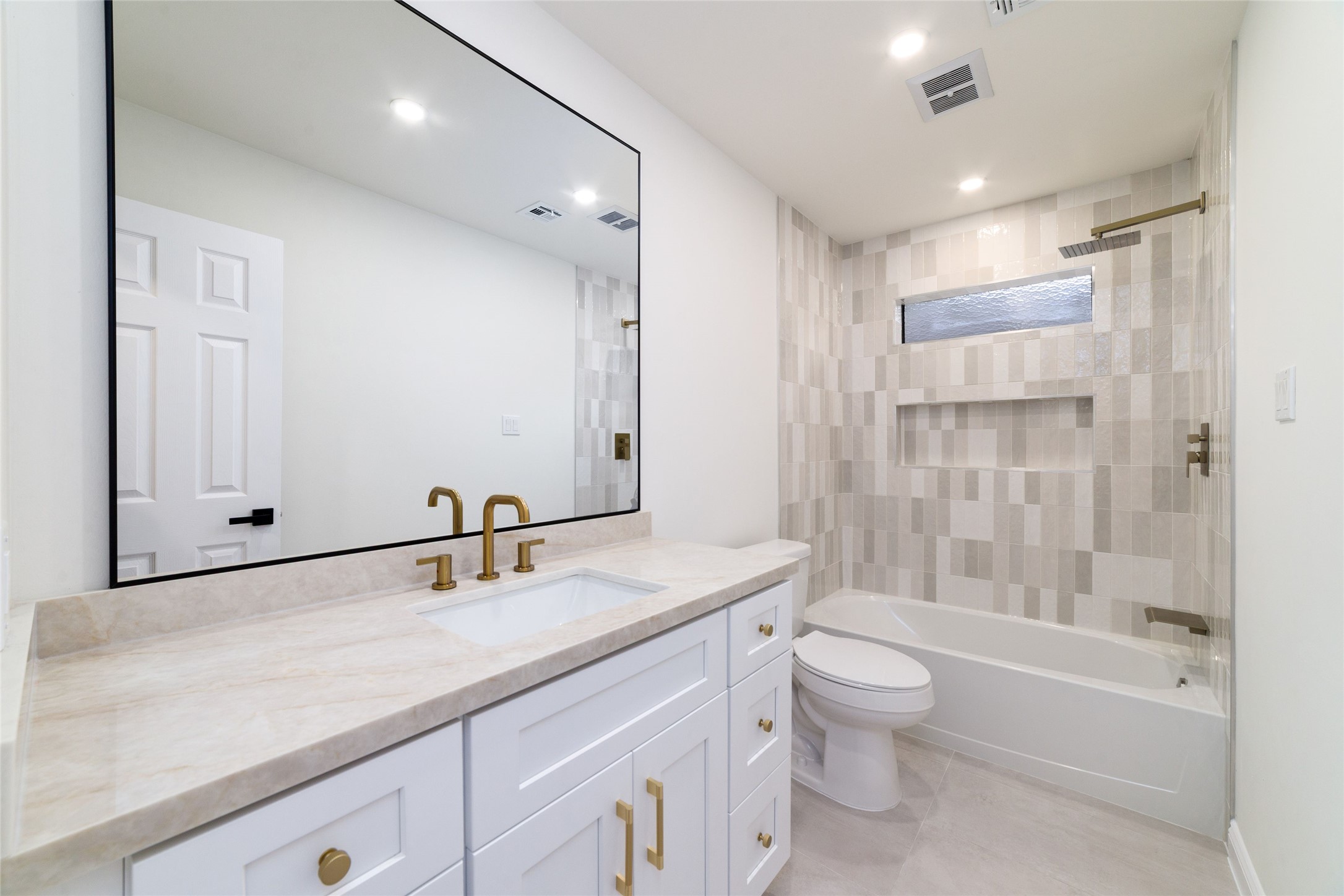 15651 Whitewater Lane Houston, TX 77079 - Photo 19 of 24 a bathroom with a sink a toilet and shower