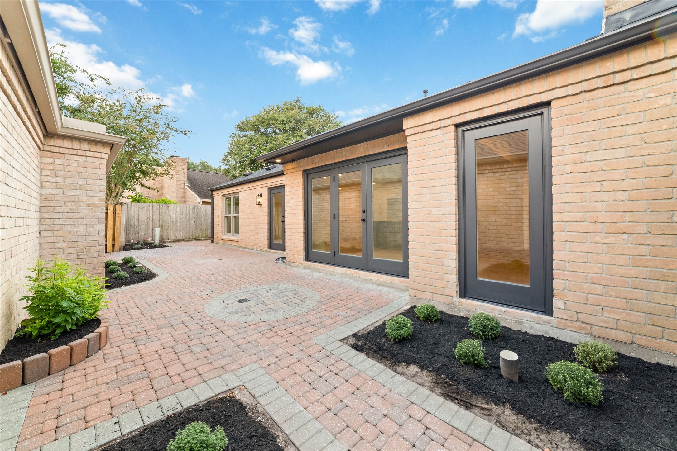 15651 Whitewater Lane Houston, TX 77079 - Photo 23 of 24 a front view of a house with garden