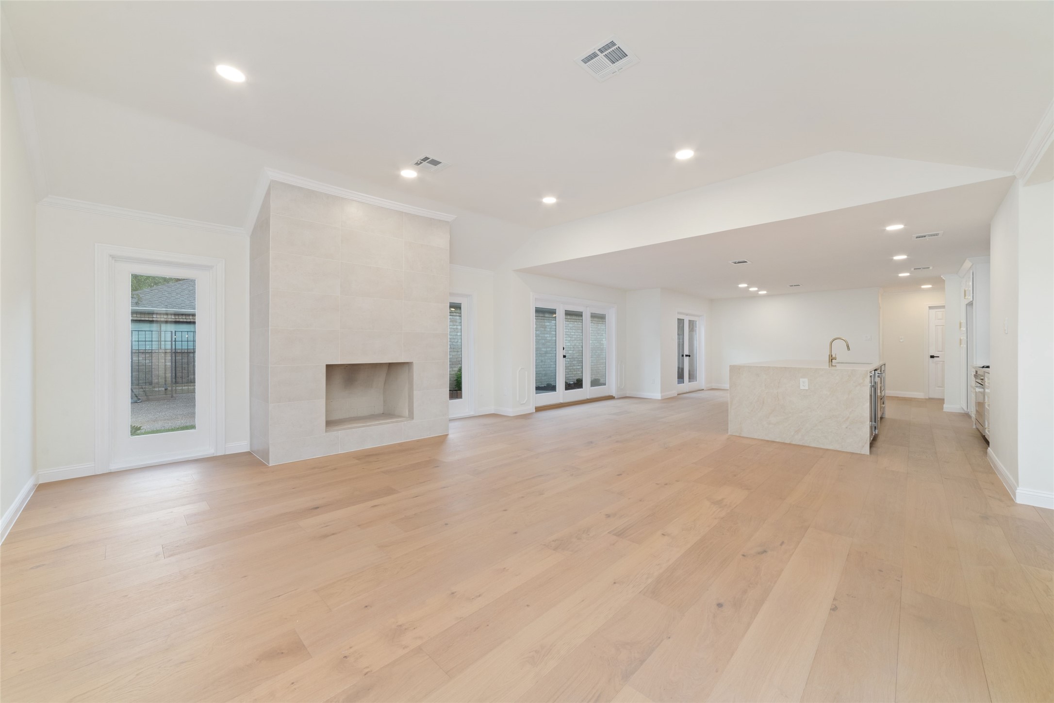 15651 Whitewater Lane Houston, TX 77079 - Photo 4 of 24 a view of an empty room with a fireplace